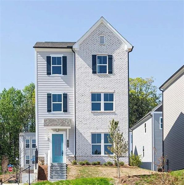 Front exterior of a new home in Madison at Buice Lake, Acworth, GA, highlighting curb appeal (Image 2). Front exterior of a new home in Madison at Buice Lake, Acworth, GA, highlighting curb appeal (Image 2).