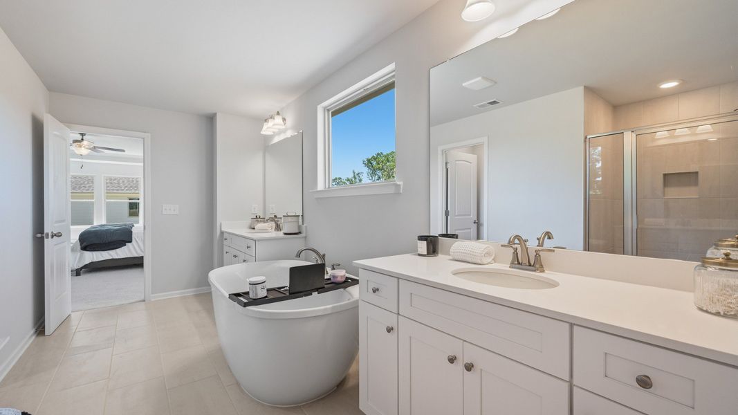 Representative furnished interior of a home built from the Stonefield - Side Entry by DRB Homes in Brighton, Locust Grove (Image 29).