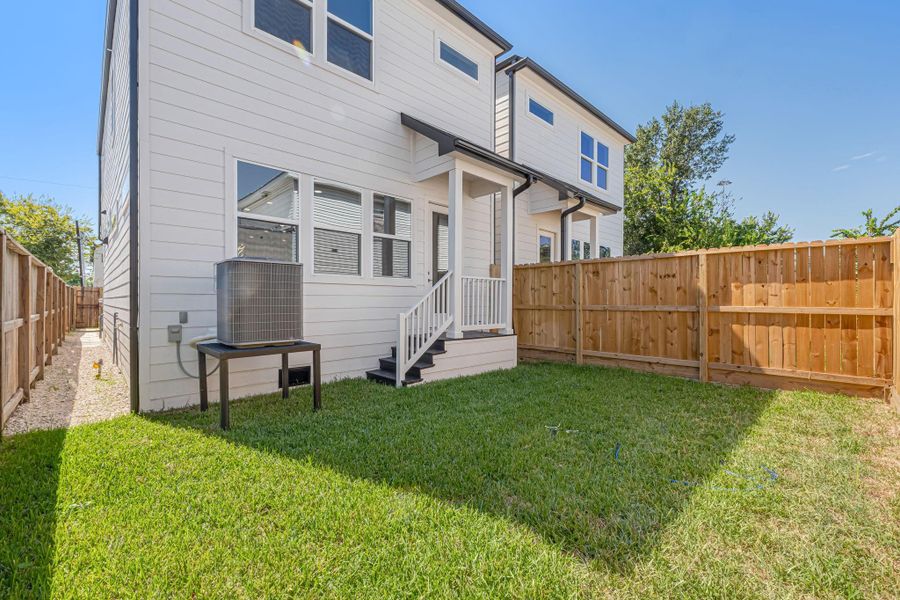 Exterior details and patio area of a home in , Houston (Image 3).