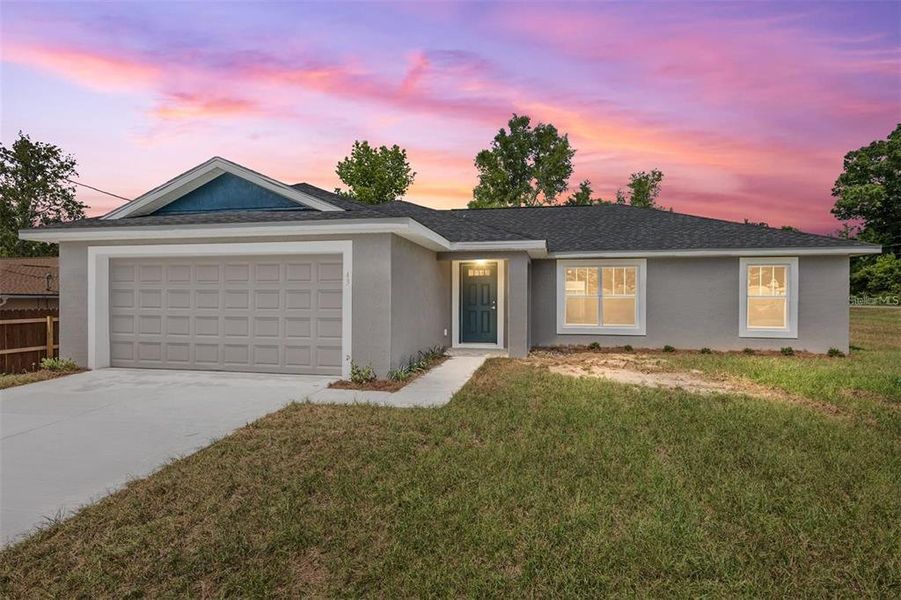 Front exterior of a new home in , Ocala, FL, highlighting curb appeal (Image 23).