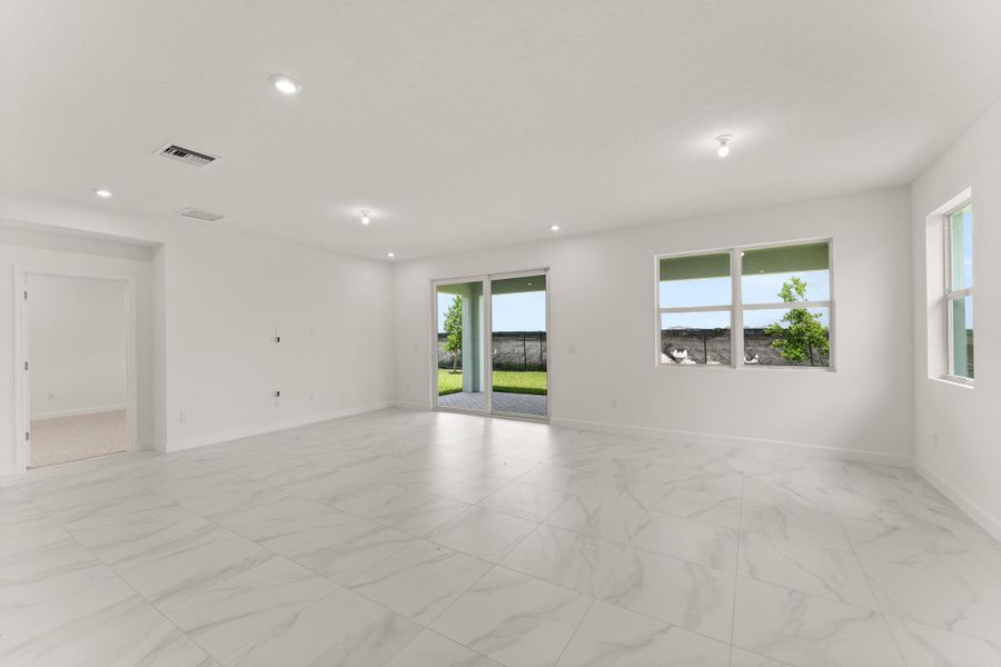 Spacious, unfurnished interior of a new home in Tradition - Cadence, Port St. Lucie (Image 9).