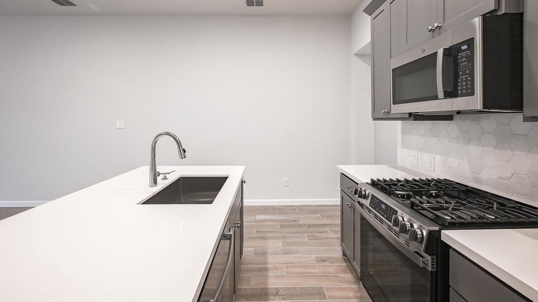 Furnished interior view inside a new home in Crosswinds 40', Kyle (Image 10).