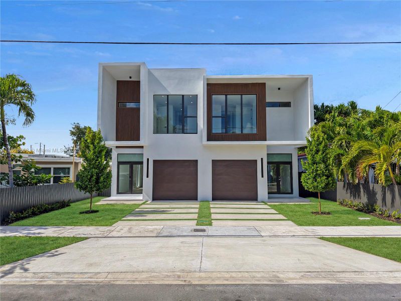 Front exterior of a new home in , Miami, FL, highlighting curb appeal (Image 22).