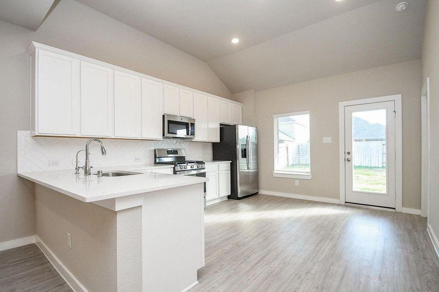 Furnished interior view inside a new home in Marvida, Cypress (Image 12).