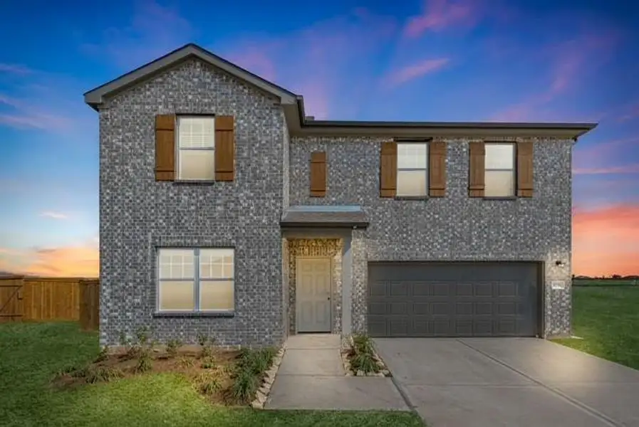 Front exterior of a new home in Sunterra Lakes, Brookshire, TX, highlighting curb appeal (Image 1).