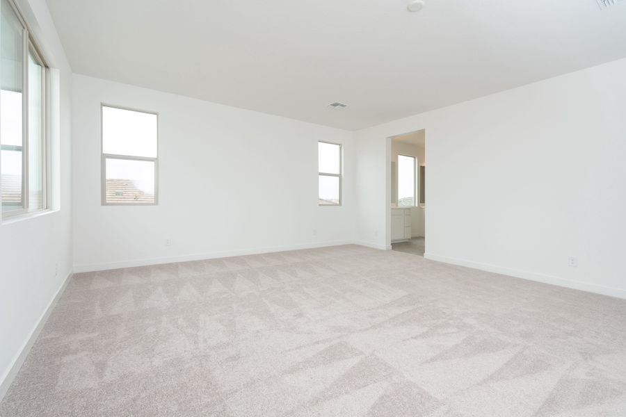 Spacious, unfurnished interior of a new home in Soleo, Queen Creek (Image 14).