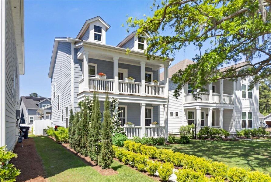 Front exterior of a new home in Oak Bluff, Charleston, SC, highlighting curb appeal (Image 28).