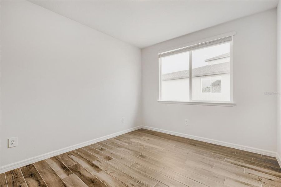 Spacious, unfurnished interior of a new home in The Grove at Stuart Crossing - Signature Series, Bartow (Image 17). Spacious, unfurnished interior of a new home in The Grove at Stuart Crossing - Signature Series, Bartow (Image 17).
