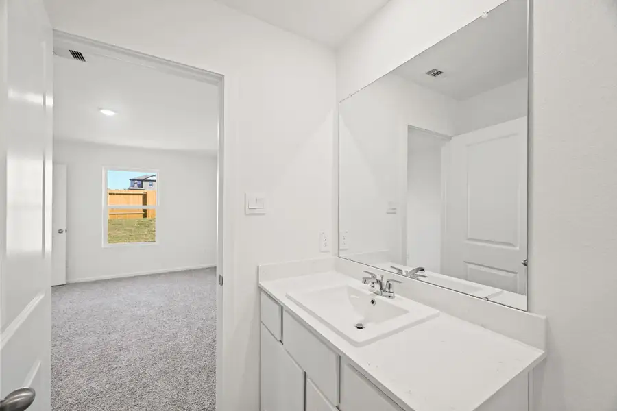 Furnished interior view inside a new home in The Canopies, Splendora (Image 6).
