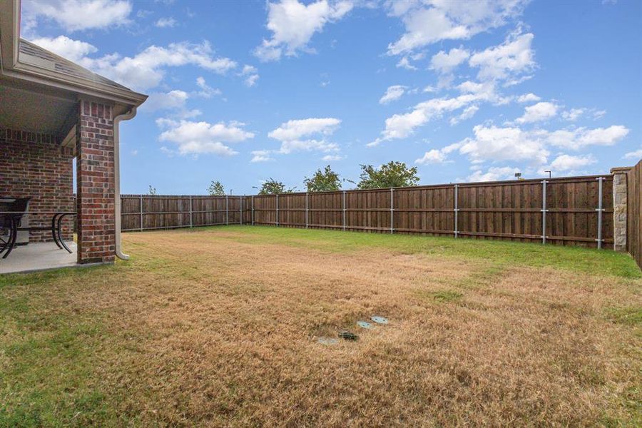 Exterior details and patio area of a home in Trailstone, Caddo Mills (Image 2). Exterior details and patio area of a home in Trailstone, Caddo Mills (Image 2).