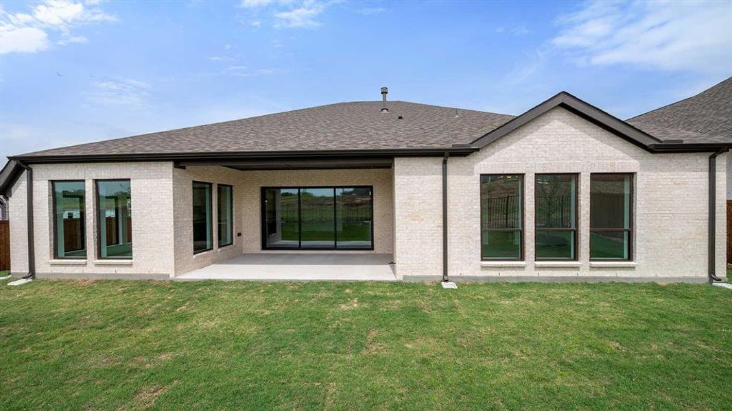 Exterior details and patio area of a home in Sweetgrass, Haslet (Image 3). Exterior details and patio area of a home in Sweetgrass, Haslet (Image 3).