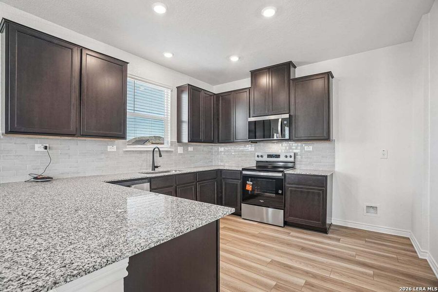 Furnished interior view inside a new home in Legend Heights - Heritage Collection, New Braunfels (Image 9).