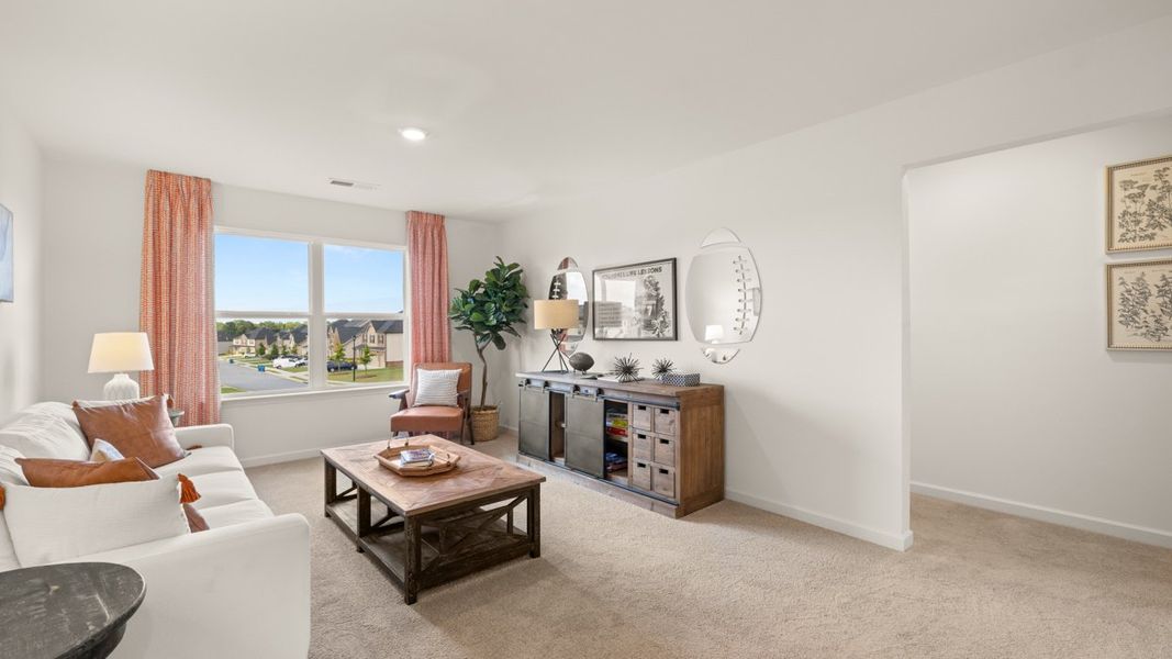 Representative furnished interior of a home built from the Holbrook by D.R. Horton in Independence, Loganville (Image 9).