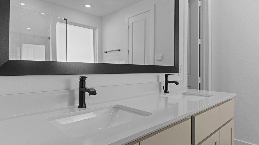 Primary bathroom with double sink vanity