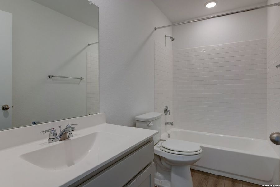 Furnished interior view inside a new home in Hennersby Hollow, San Antonio (Image 8).