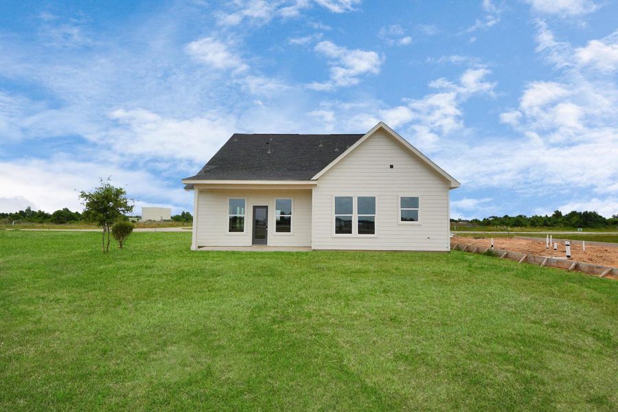 A modern, two-story home with a spacious driveway and a two-car garage. The exterior features a mix of light siding and dark accents, complemented by a neatly landscaped front path. Offering a serene and inviting atmosphere. A modern, two-story home with a spacious driveway and a two-car garage. The exterior features a mix of light siding and dark accents, complemented by a neatly landscaped front path. Offering a serene and inviting atmosphere.