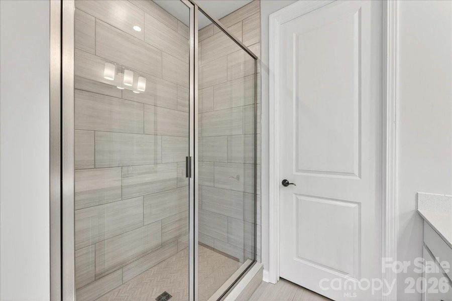 Tiled primary walk-in shower Tiled primary walk-in shower