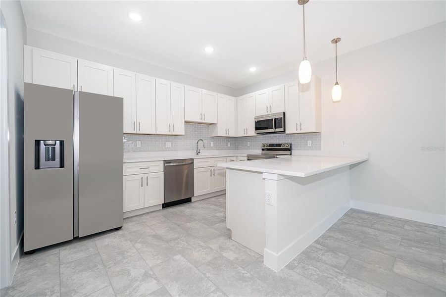 Furnished interior view inside a new home in , Kissimmee (Image 4).