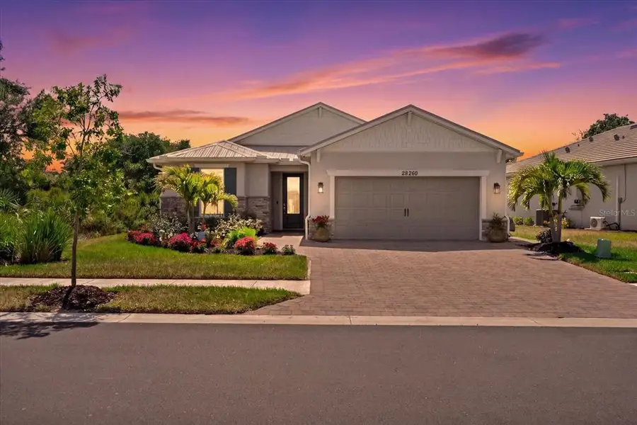 Front exterior of a new home in , Englewood, FL, highlighting curb appeal (Image 23).