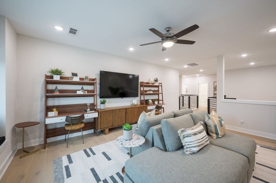 Representative furnished interior of a home built from the Barnhart by Tri Pointe Homes in Dunham Pointe, Cypress (Image 31).