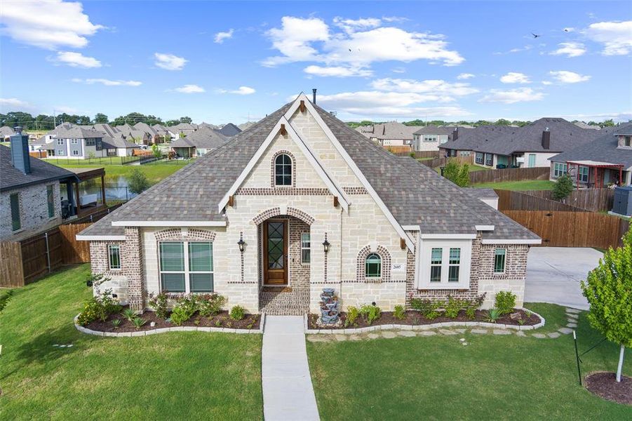 Front exterior of a new home in , Mansfield, TX, highlighting curb appeal (Image 22). Front exterior of a new home in , Mansfield, TX, highlighting curb appeal (Image 22).