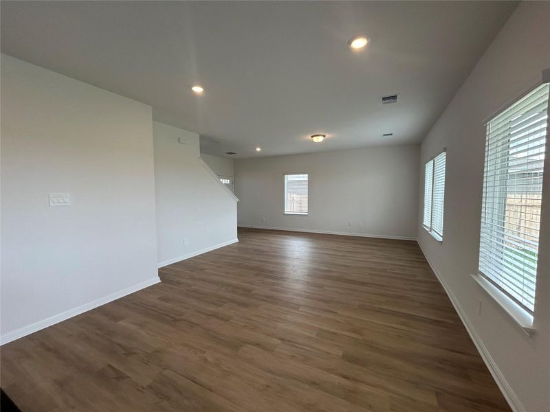 Unfurnished room featuring wood-type flooring and recessed lighting