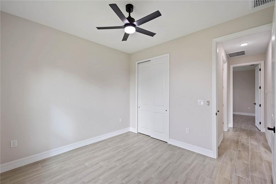Spacious, unfurnished interior of a new home in , Port Charlotte (Image 28).