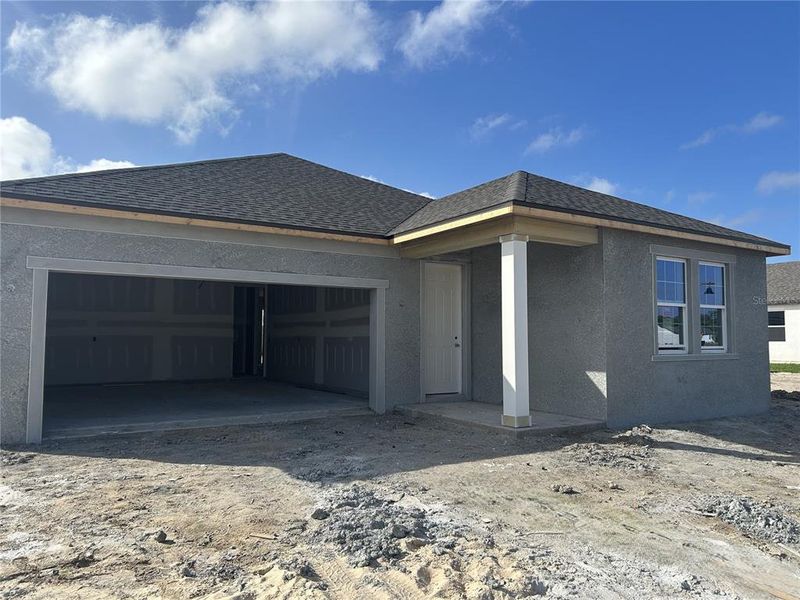 In-progress construction of a new home in Oakfield Trails, Parrish, FL (Image 17).