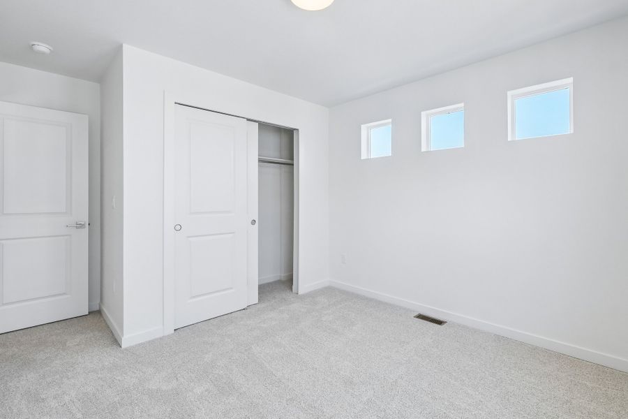 Spacious, unfurnished interior of a new home in The Vistas at West Mesa, Colorado Springs (Image 17).