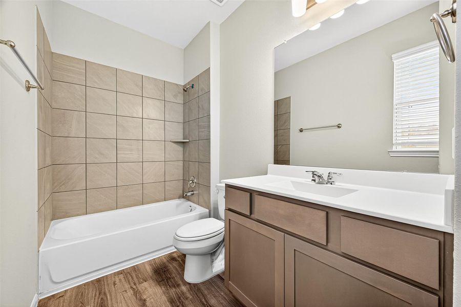 Furnished interior view inside a new home in Sunterra, Katy (Image 16).