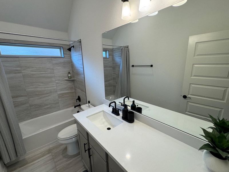 Furnished interior view inside a new home in Sunfield, Buda (Image 16).