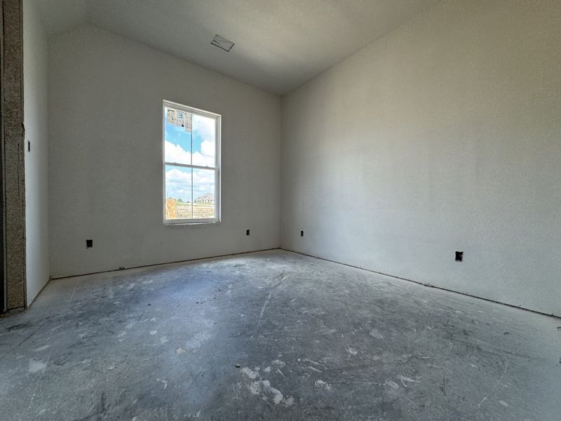 In-progress construction of a new home in Coyote Crossing, Godley, TX (Image 13).