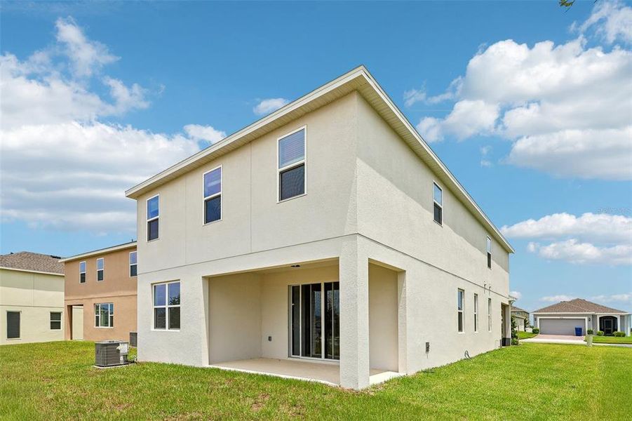Exterior details and patio area of a home in Trinity Lakes, Groveland (Image 21).