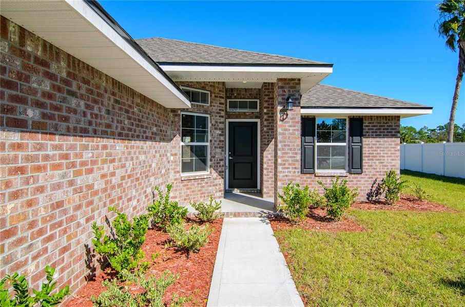 Exterior details and patio area of a home in Palm Coast, Palm Coast (Image 20).