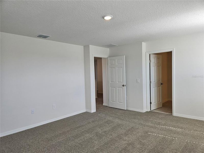 Spacious, unfurnished interior of a new home in Lawson Dunes - Signature Series, Haines City (Image 44).