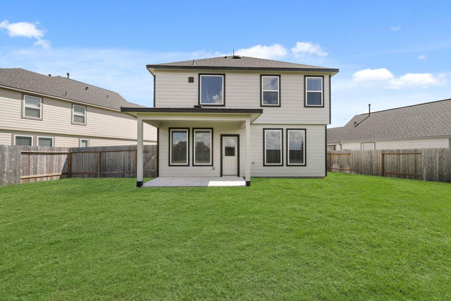 Front exterior of a new home in Grand Oaks Village, Houston, TX, highlighting curb appeal (Image 12). Front exterior of a new home in Grand Oaks Village, Houston, TX, highlighting curb appeal (Image 12).