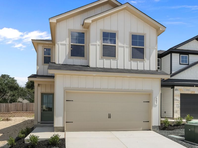 Front exterior of a new home in Meadows at Oak Creek, San Antonio, TX, highlighting curb appeal (Image 23). Front exterior of a new home in Meadows at Oak Creek, San Antonio, TX, highlighting curb appeal (Image 23).