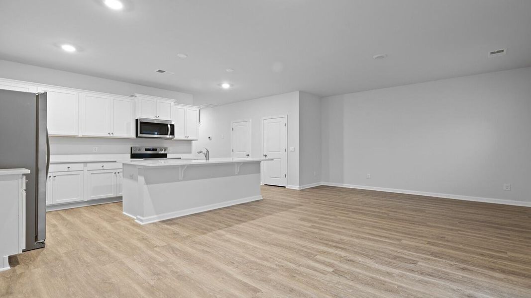 Furnished interior view inside a new home in Garbon Fields, Summerville (Image 10).