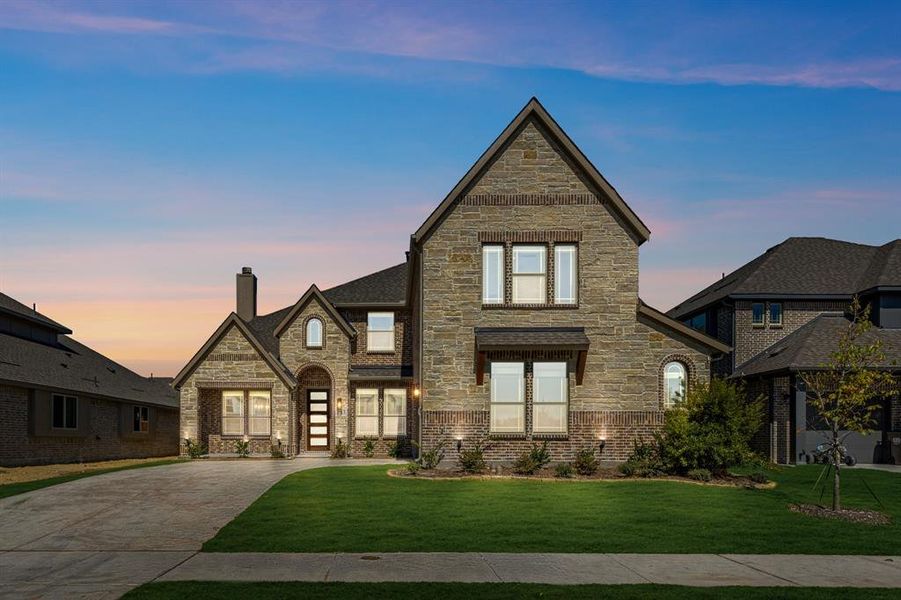 Front exterior of a new home in Liberty, Melissa, TX, highlighting curb appeal (Image 2). Front exterior of a new home in Liberty, Melissa, TX, highlighting curb appeal (Image 2).