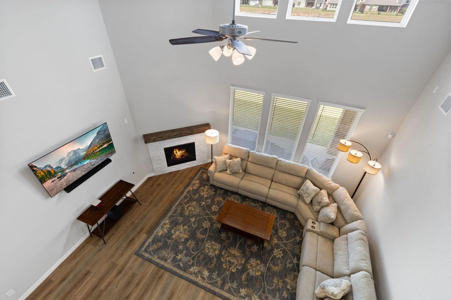 A birds eye view of the family room from the upstairs game room.