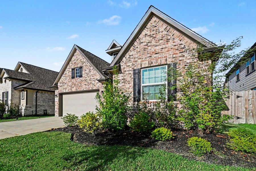 Front exterior of a new home in , League City, TX, highlighting curb appeal (Image 16).