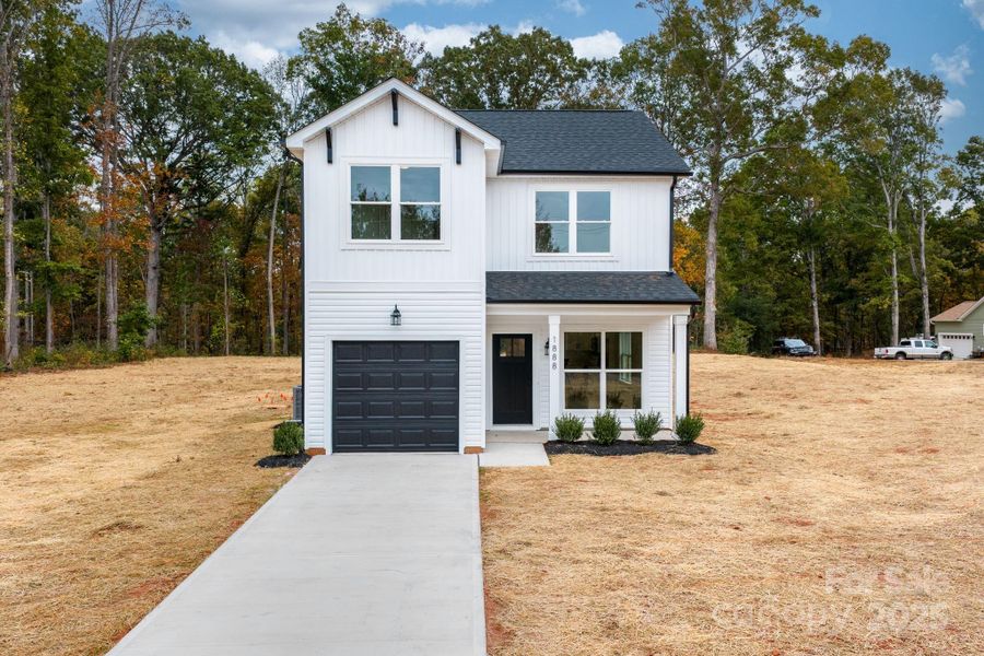 Front exterior of a new home in , Newton, NC, highlighting curb appeal (Image 22). Front exterior of a new home in , Newton, NC, highlighting curb appeal (Image 22).