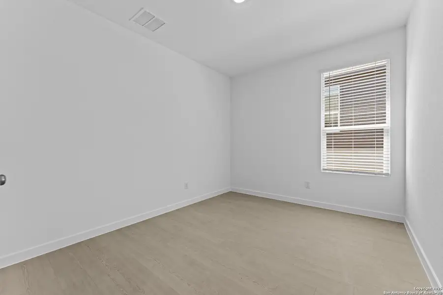 Spacious, unfurnished interior of a new home in Waterwheel: Coastline Collection, San Antonio (Image 9).