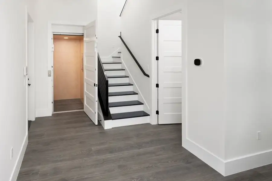 Representative unfurnished interior of a home built from the Grand Spinnaker by Minto Communities in Latitude Margaritaville Watersound, Panama City Beach (Image 14).