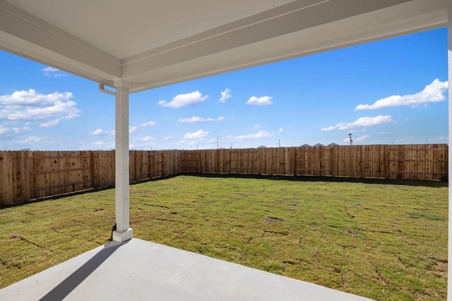 Exterior details and patio area of a home in Willow Springs, Buda (Image 4).