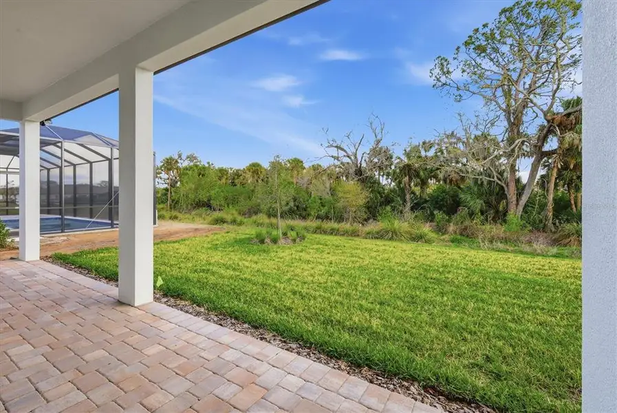 Exterior details and patio area of a home in , Parrish (Image 4).