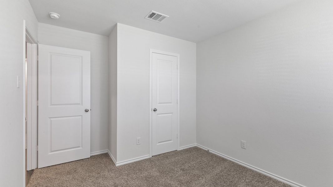 Spacious, unfurnished interior of a new home in Stonewyck Farms, Ennis (Image 23).