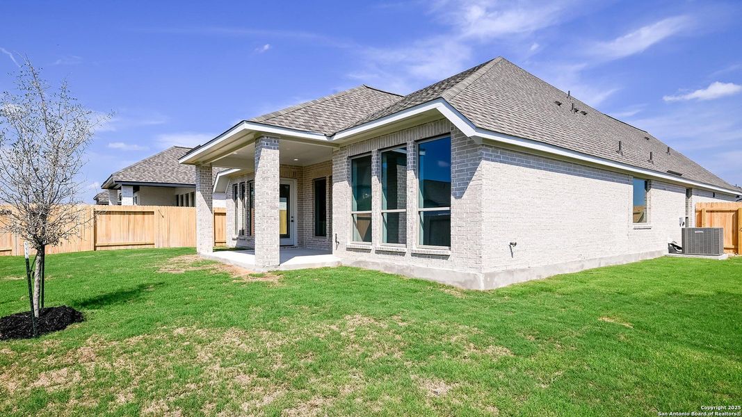 Exterior details and patio area of a home in Meadows Of Mill Creek 50', Seguin (Image 3). Exterior details and patio area of a home in Meadows Of Mill Creek 50', Seguin (Image 3).