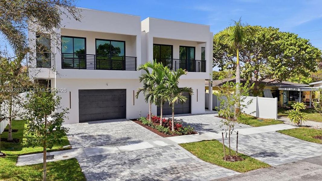 Front exterior of a new home in , Fort Lauderdale, FL, highlighting curb appeal (Image 20).