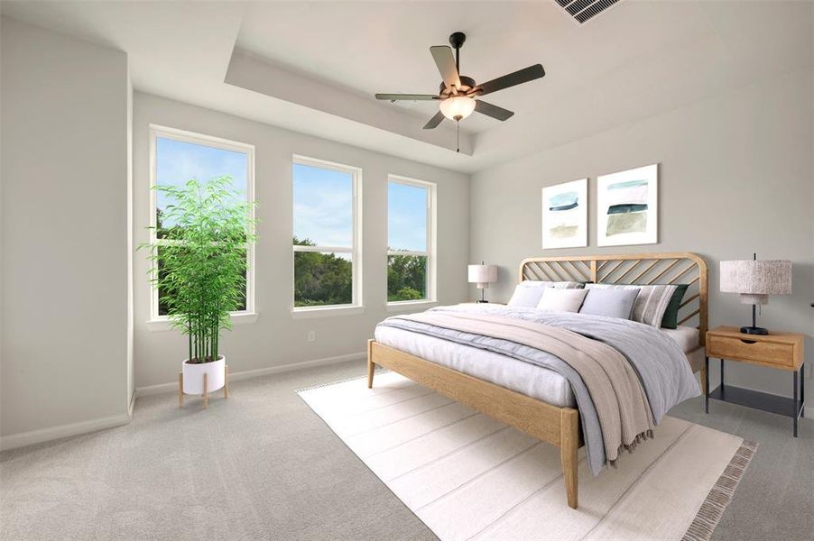 Bedroom featuring a tray ceiling with a ceiling fan, three large windows, light gray wall paint, and light gray carpet Bedroom featuring a tray ceiling with a ceiling fan, three large windows, light gray wall paint, and light gray carpet